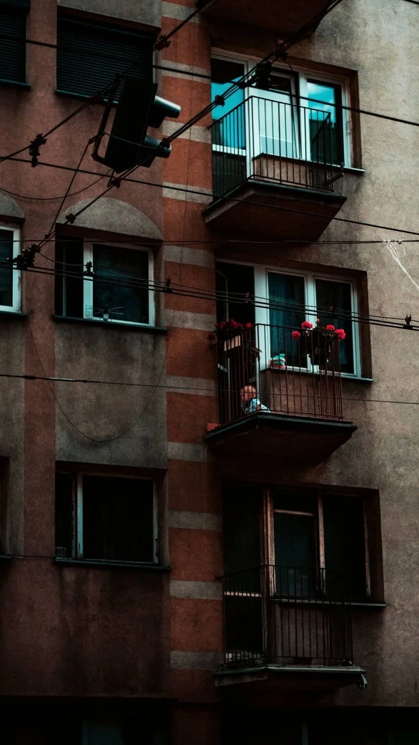 Apartment balconies and overhead wires, W:9 H:16, photograph 45