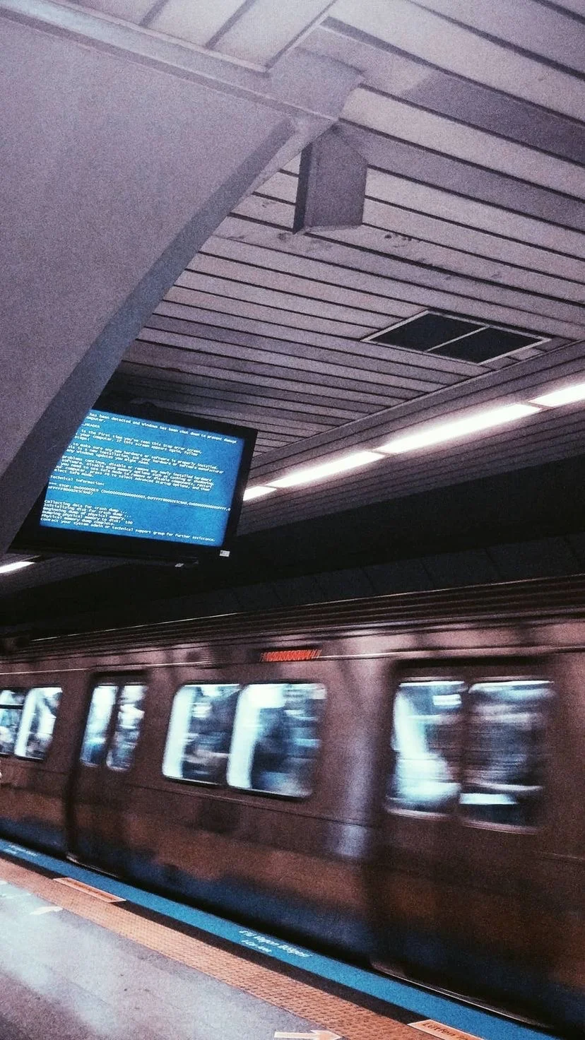 A train moving through a tiled station, W:9 H:16, photograph 14