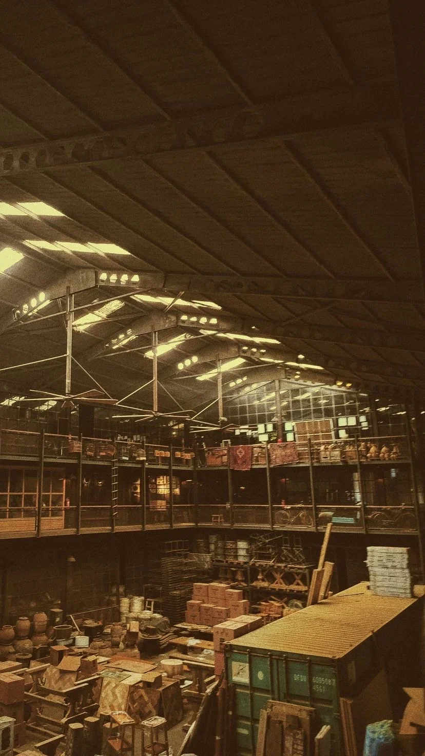 Warmly lit interior of a covered market, W:9 H:16, photograph 42