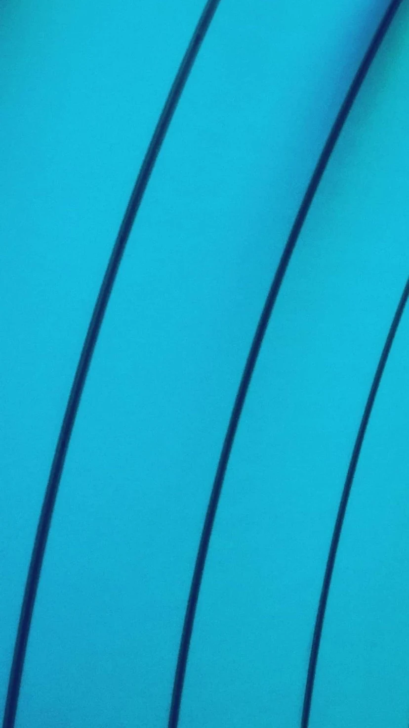 Three dark cables crossing a turquoise field, W:9 H:16, photograph 71